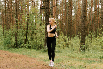 Woman Runner. Fitness Girl Running outdoors