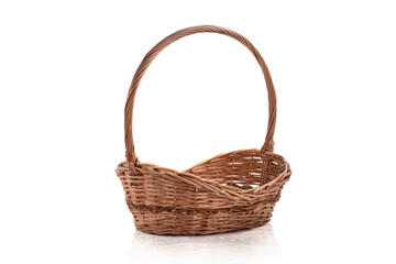 Obraz premium Empty wicker basket isolated with copy space isolated on white background