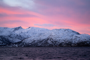 Sunrise with pink sky over Kaldfjord Norway