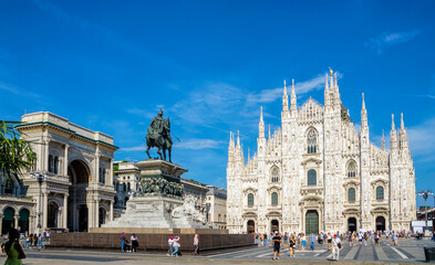 Milan Cathedral (Duomo di Milano) and Vittorio Emanuele II equestrian statue at Cathedral square of...