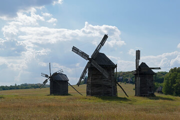 Fototapeta na wymiar Ukrainian landscape and ancient mills of the 17th century.