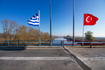 The Greek-Turkish border line right on the bridge over the river Evros, in Thrace region. The grey...