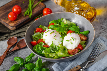 Organic egg benedict with salad