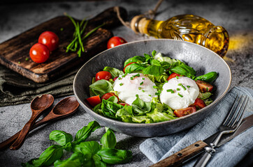 Organic egg benedict with salad