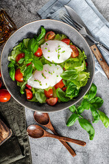 Organic egg benedict with salad