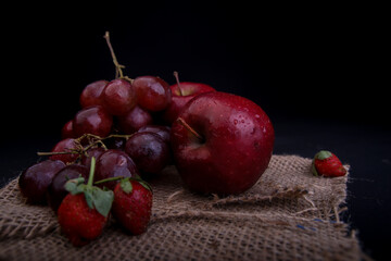 RED FRUIT BLACK BACKGROUND
