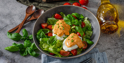 Organic egg benedict with salad