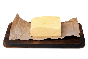 Butter on wooden board isolated on white background