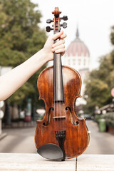 Violin in Budapest in female hands