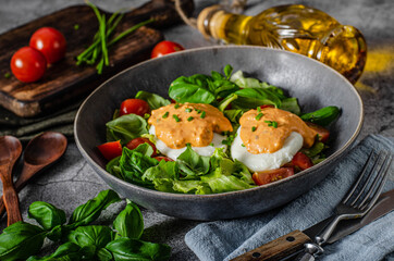 Organic egg benedict with salad