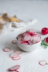 Sliced Radishes on white background (close-up shot)