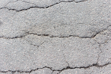 texture asphalt with multiple cracks