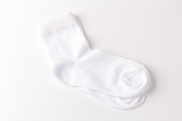 Fototapeta na wymiar White cotton socks isolated on white background