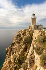 Fototapeta na wymiar The lighthouse at Cape Melagkavi, at the Corinthian gulf, in continental Greece, Europe.