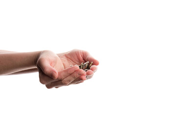 Obraz premium The coins in hand on white background, concept of calculating expenses, incomes and expenses.