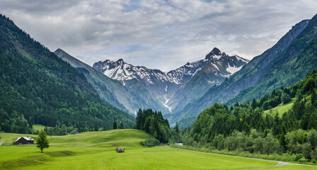 Lush green valley surrounded by alps near Oberstdorf, Germany © HarishRao