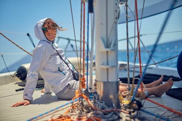 Gordijnen Summertime cruising and enjoying on a sailing boat at open sea. © astrosystem