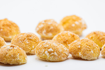 Sweet little bread with sugar on white background
