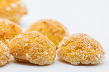 Sweet little bread with sugar on white background
