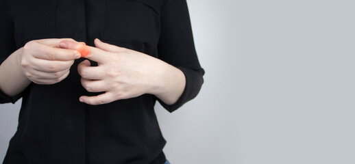 Woman suffers from pain in fingers. Arthritis or arthrosis, cartilage wear, rheumatism of the...