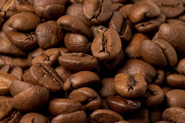 Coffee beans as background texture close-up.