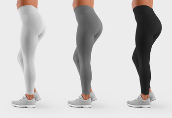 Mockup of white, gray, black leggings on a model, clothes for sports and fitness, side view for design presentation.