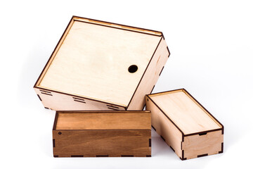 THREE different square wooden boxes. Top view, box packing. Gift wrapping.