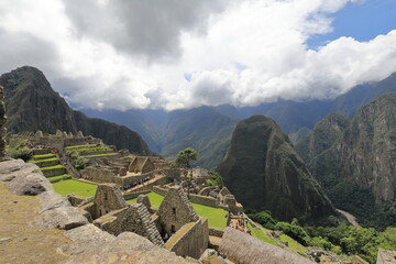 The detail of Inca buildings in the ancient city of Machu Picchu in Peru	