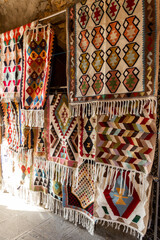 National carpets with Caucasian patterns are for sale in the old town