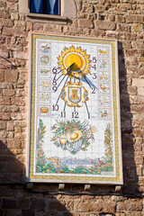 Ancient sundial in a traditional Catalan rural house.