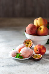 Japanese ice cream Mochi with peach, in rice dough. Traditional Japanese dessert on white background.