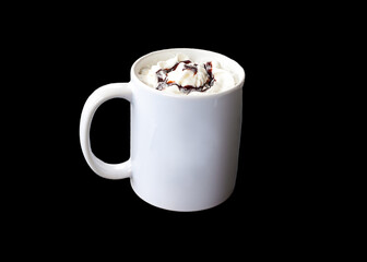 white cup whipped cream and chocolate syrup with copy space on a black background.
