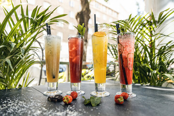 Summer detox beverage concept. Citrus fruit drinks with ice alcohol. Healthy diet cocktail with...