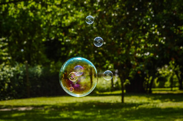 Floating soap bubbles close up