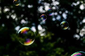 Floating soap bubbles close up