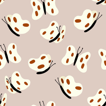 Seamless colorful pattern with butterflies with red dots in minimalistic style. Cute repeated background for fabrics or wallpapers. Butterfly design.