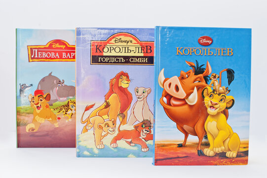 Hai, Ukraine - February 28, 2017: Animated Disney movies cartoon production book sets Lion King on white background.