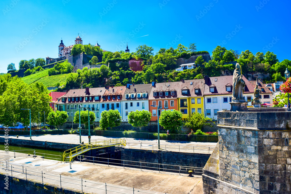 Wall mural the mighty fortress marienberg is the symbol of wurzburg. festung marienberg rises above the river m