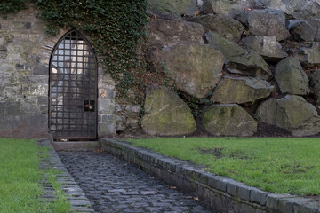 Door in old Dublin city wall at Cook street. Dublin, Ireland. February 2019