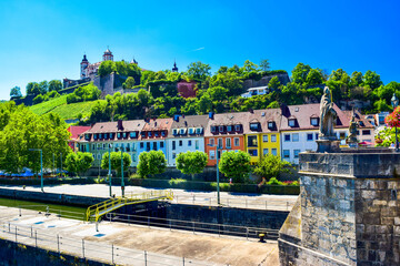 The mighty fortress Marienberg is the symbol of Wurzburg. Festung Marienberg rises above the River Main and vineyards on the hillside. Germany.