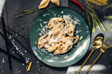 Set of pasta from worldwide cuisines.  in bowl on rustic stone background. Top view. Italian cuisine. Top view
