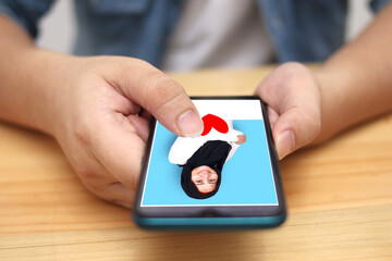 Close up of male hand holding phone and give like or love button on his social media friend photo, lifestyle modern internet concept