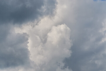 Fototapeta premium sunlight through very dark clouds background