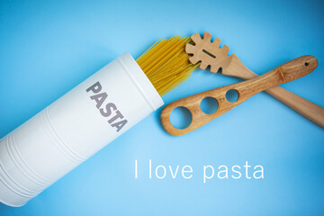 Italian pasta for a restaurant on a blue table background top view.