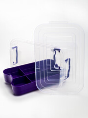 transparent container with purple lid