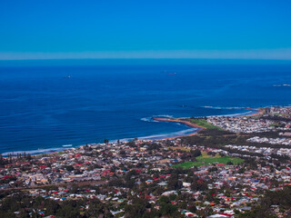 Panoramic view of Wollongong Sydney Australia from Bulli Lookout on a sunny winters day blue skies 