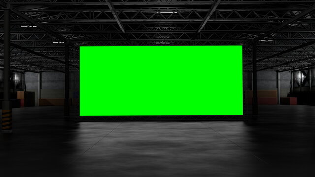 3d rendering of dark empty factory interior or empty warehouse, a green screen backdrop in the middle