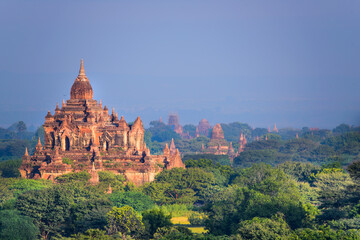 Bagan, Myanmar Temples in the Archaeological Park, Burma. Sunrise. Fog in the Sky