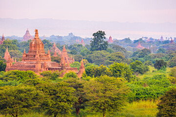 View of a Majestic Ancient Pagoda inside a Forest in Bagan, Myanmar. Beautiful Morning Time, Copy Space 