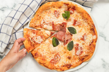 Homemade pizza, one slice is cut out